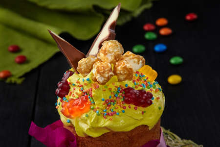 Yellow whipped egg whites with sweets onEaster cake