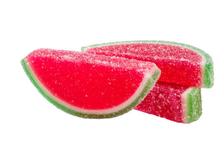 Gummy candies shaped like watermelon slices isolated on whiteの写真素材