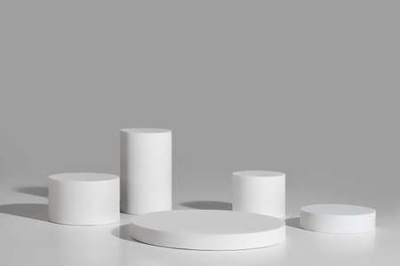Podium mockup with five cylinders on gray background
