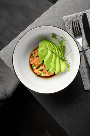 Salmon tartare with cucumber, avocado and Pan Asian sauceの写真素材