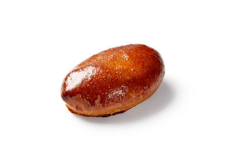 Delicious homemade piroshki pastry resting on white backgroundの写真素材