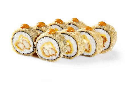Hot fried sushi rolls with chicken, cheese and sauce isolated on whiteの写真素材