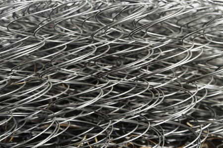 old steel shiny springs from old couchの写真素材