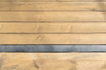 new planks and one old plank backgroundの写真素材