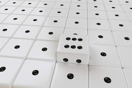 rows of white dices with one ejectedの写真素材