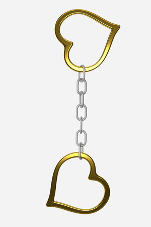 rendered hanging heart-shaped golden handcuffs on the white backgroundの写真素材
