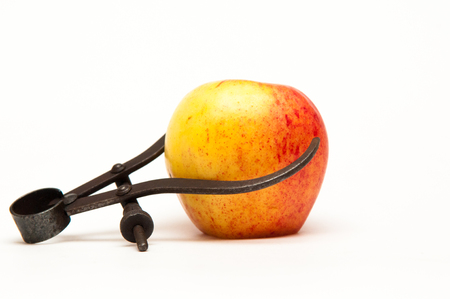 fresh apple being measured to represent weight lossの写真素材