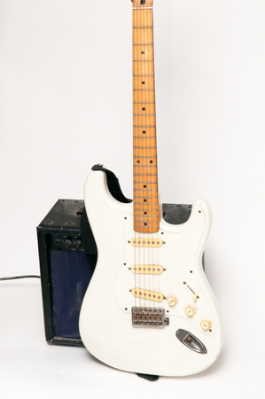 Electric guitar on a bright white plain backgroundの写真素材