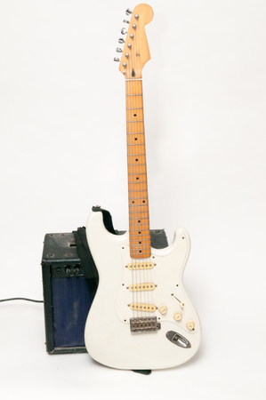 Electric guitar on a bright white plain backgroundの写真素材