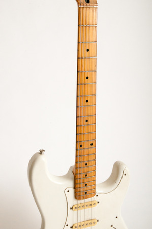 Electric guitar on a bright white plain backgroundの写真素材