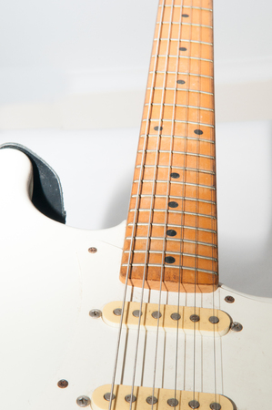Electric guitar on a bright white plain backgroundの写真素材