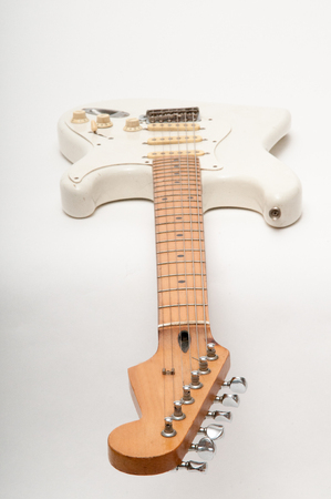 Electric guitar on a bright white plain backgroundの写真素材