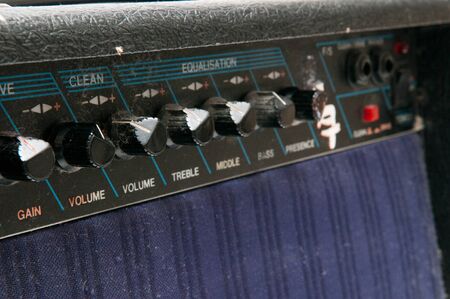 Close up of old worn out guitar amp