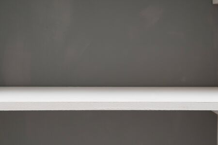 Empty white shelves ideal for placing an objectの写真素材