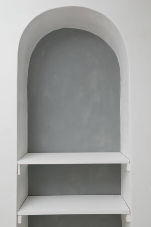 Empty white shelves ideal for placing an objectの写真素材
