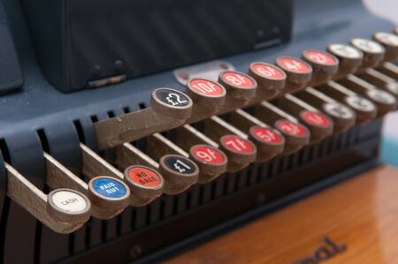 Close up of keys on a vintage cash registerの写真素材