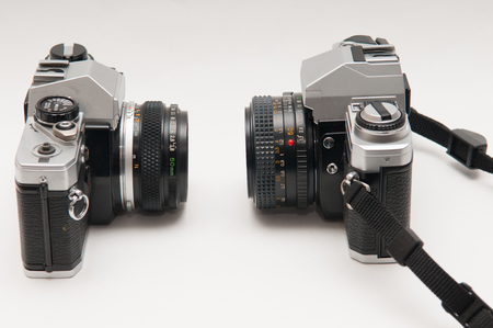old vintage style film camera on a white backgroundの写真素材