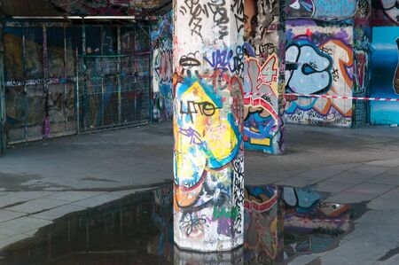 Urban scene in a city with graffiti on the wallsのeditorial素材