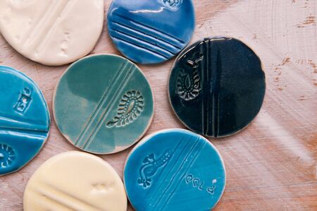 hand made creative ceramic products and objects arranged in a patternの写真素材