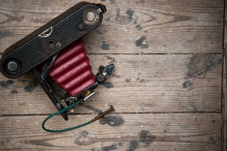 Retro vintage style camera with old fashioned shutter