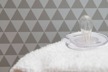 parenting for newborn baby background of dummy on a white towelの写真素材