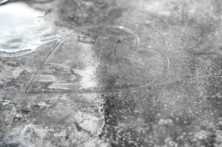 Love heart shape frozen in ice for valentines dayの写真素材