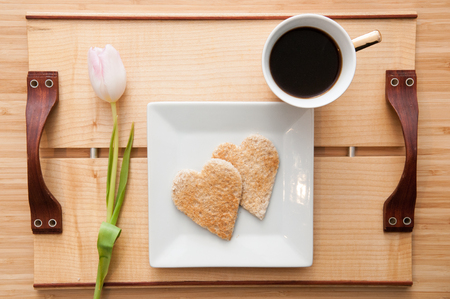 Romantic valentines day breakfast, love heart shape toast and coffee. Overhead viewの写真素材