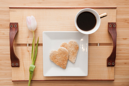Romantic valentines day breakfast, love heart shape toast and coffee. Overhead viewの写真素材