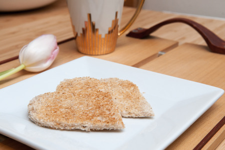 Romantic breakfast in bed concept. Overhead viewの写真素材