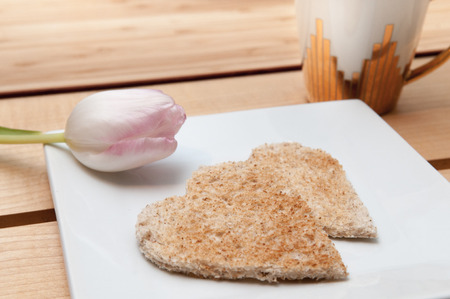 Romantic valentines day breakfast, love heart shape toast and coffee. Overhead viewの写真素材