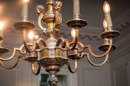 vintage chandelier light hanging from the ceilingの写真素材