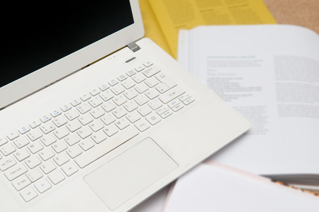 Education and business learning, laptop with booksの写真素材