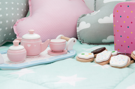 Children's bedroom interior with tea set and toysの写真素材