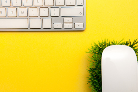 bright and modern work space desk top with office equipmentの写真素材