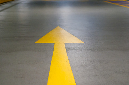 Yellow road traffic marking on the street