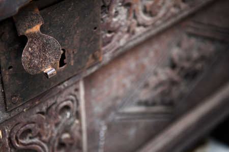 old antique wooden chest with padlock claspの写真素材