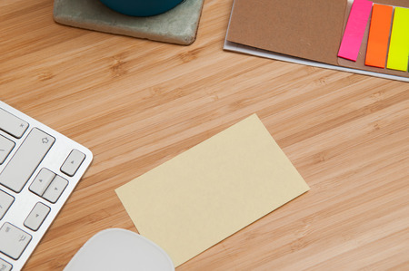 blank paper note on a table with copy space to add your own textの写真素材