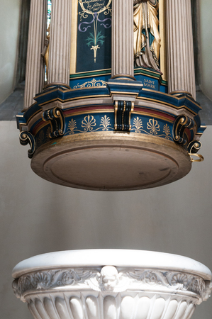 Ornate stone font in a churchの写真素材