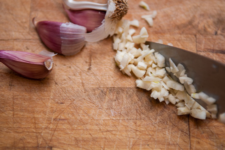 Fresh garlic food ingredient for a cookery backgroundの写真素材