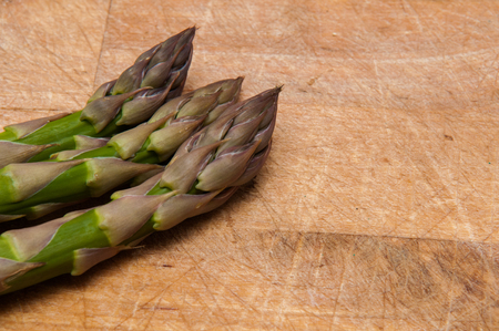 Fresh Asparagus on a rustic style backgroundの写真素材