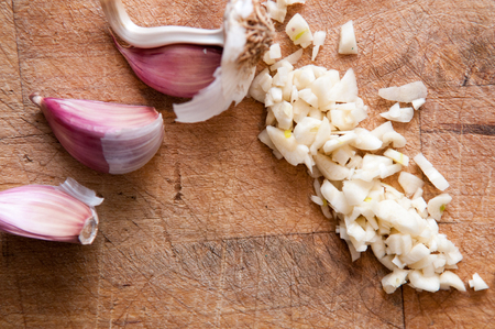 Fresh garlic food ingredient for a cookery backgroundの写真素材
