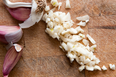 Fresh garlic food ingredient for a cookery backgroundの写真素材