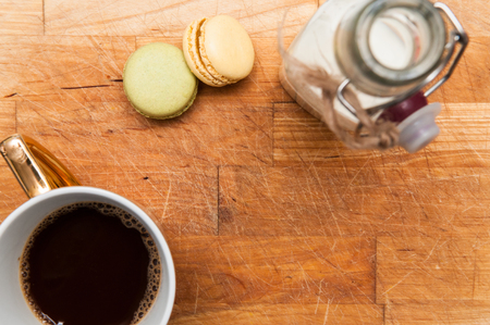 milk and cookies on a wooden table with vintage milk bottleの写真素材