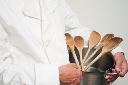 chef preparing food cooking with a panの写真素材