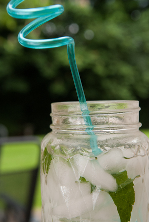 Mojito cocktail freshly made in a retro style glass jarの写真素材