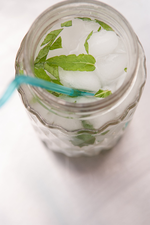 Mojito cocktail freshly made in a retro style glass jarの写真素材