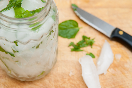 Mojito cocktail freshly made in a retro style glass jarの写真素材