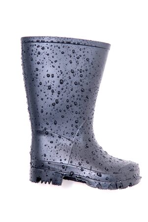 black wellington boot with water dropletsの写真素材