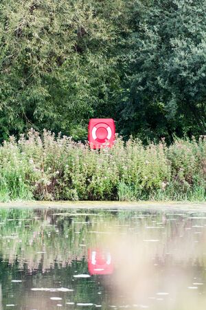 Life ring buoy at a lakeの写真素材
