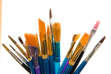 Paint brushes isolated, used artist tools with copy space